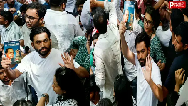 अभिजीत हाथ में बाबा साहब की किताब लेकर पहुंचे, शिक्षा व्यवस्था में गड़बड़ी को लेकर विरोध