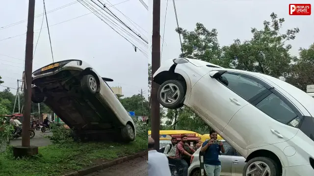 बेकाबू कार बिजली के पोल से टकराकर हवा में लटकी, तस्वीरें देख हर कोई हैरान